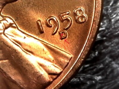 1958-D wheat penny RPM repunched mint mark showing secondary ghost D beside the primary D
