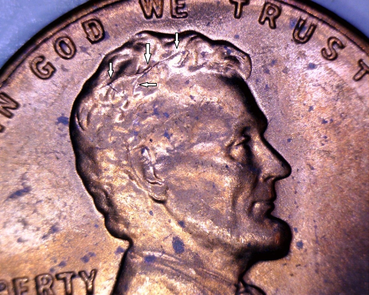 1958 wheat penny BIE error showing raised vertical die crack between B and E in LIBERTY